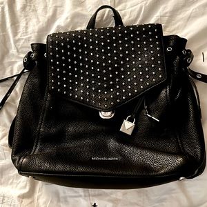 MK backpack bag with silver studs